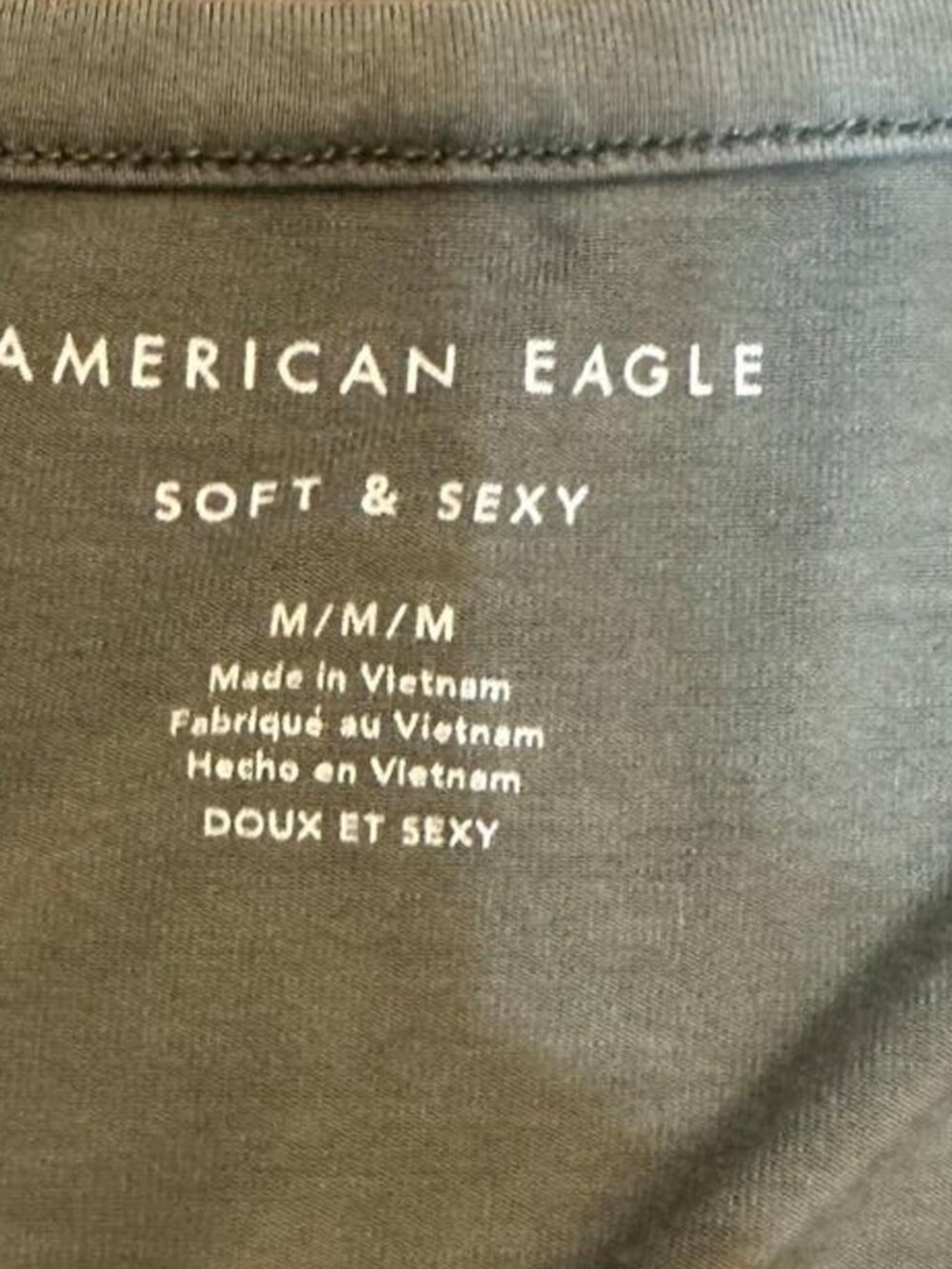 American Eagle women’s green long sleeve top with button details. Size M #americ